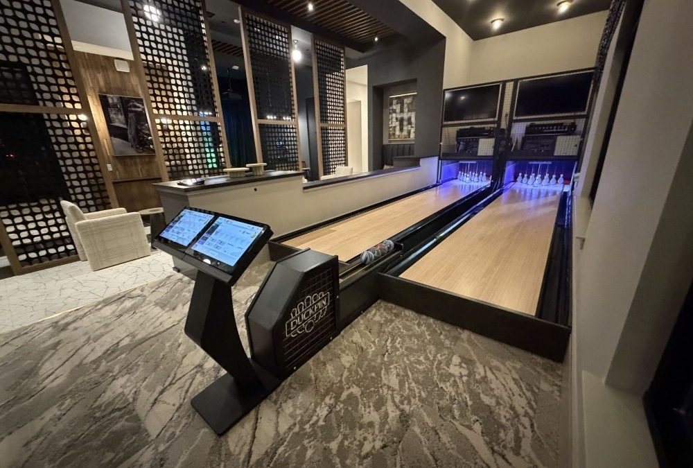Duckpin bowling alley with two lanes and Nexus-style touchscreen scoring installed in upscale apartment amenity space