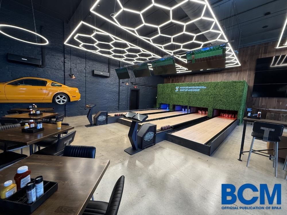 Award-winning duckpin bowling alley inside Old Route 69 Brewery with modern design, seating, and two bowling lanes