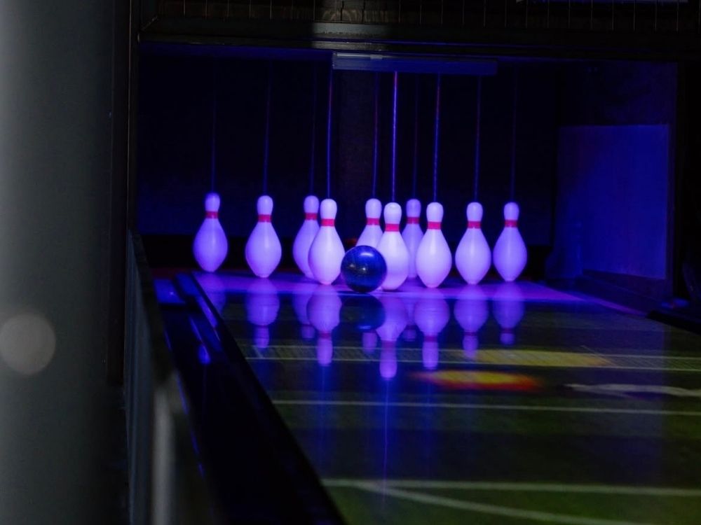 Funk – Blog Images (V2) (73) Bowling installation featuring Funk duckpin lanes with interactive on-lane projection, string pinsetter technology, and illuminated pins at RecRoom in Downtown Lakeland.